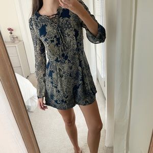 Printed Blue Long-Sleeve Romper | Fashion Union